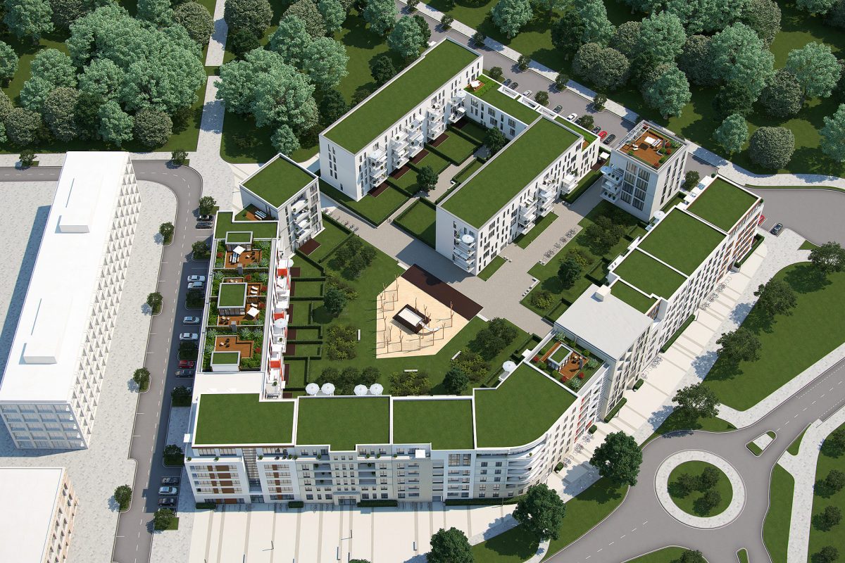 Moderne Wohnanlage mit begrünten Dächern und zentralem Innenhof.