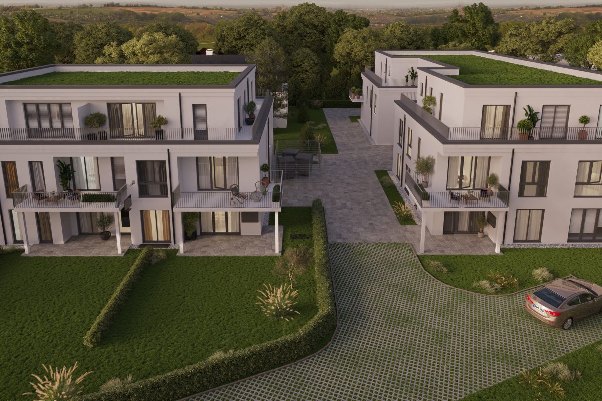 Zwei moderne, mehrstöckige Wohngebäude mit begrünten Flachdächern in einer grünen, parkähnlichen Umgebung.